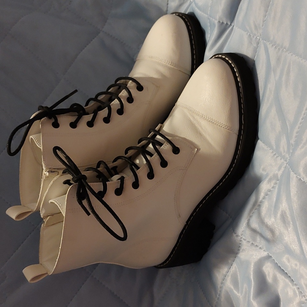 White and black combat style boots
